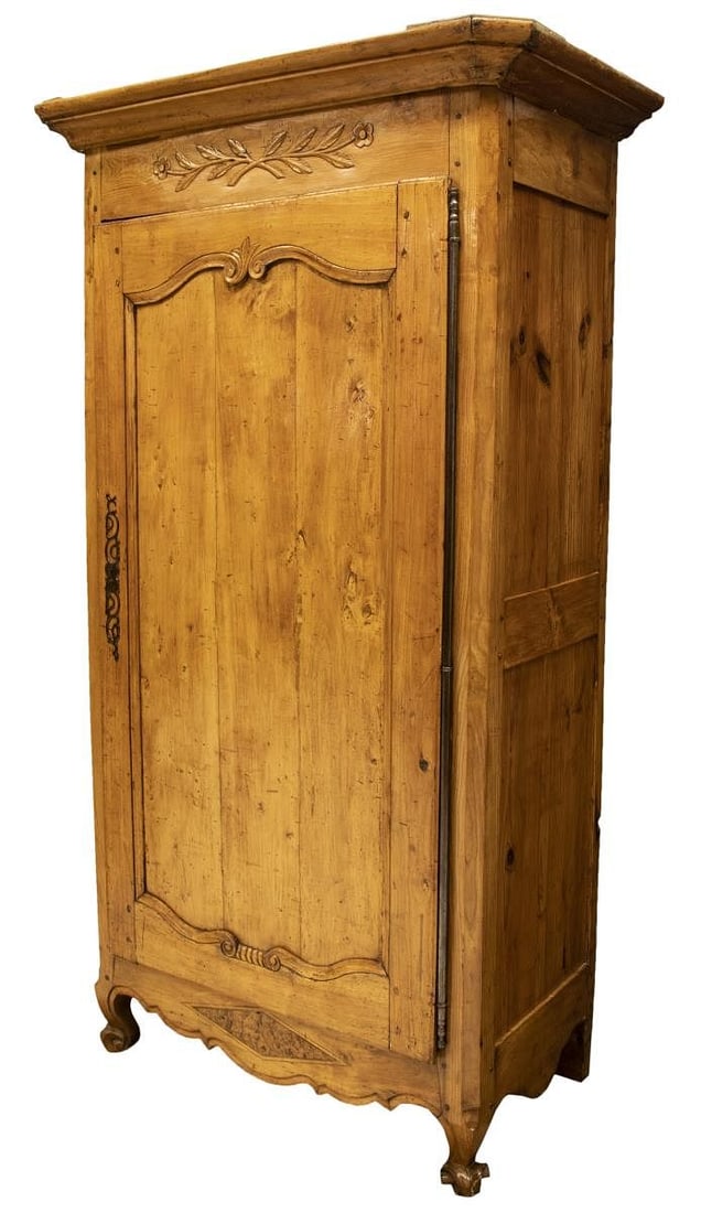 FRENCH PROVINCIAL LOUIS XV STYLE PINE BONNETIERE: French Provincial Louis XV style pine bonnetiere, 19th c., having cornice top with canted corners, over corresponding case, fitted with a single paneled door, on long exterior hinge, scrolled iron loc