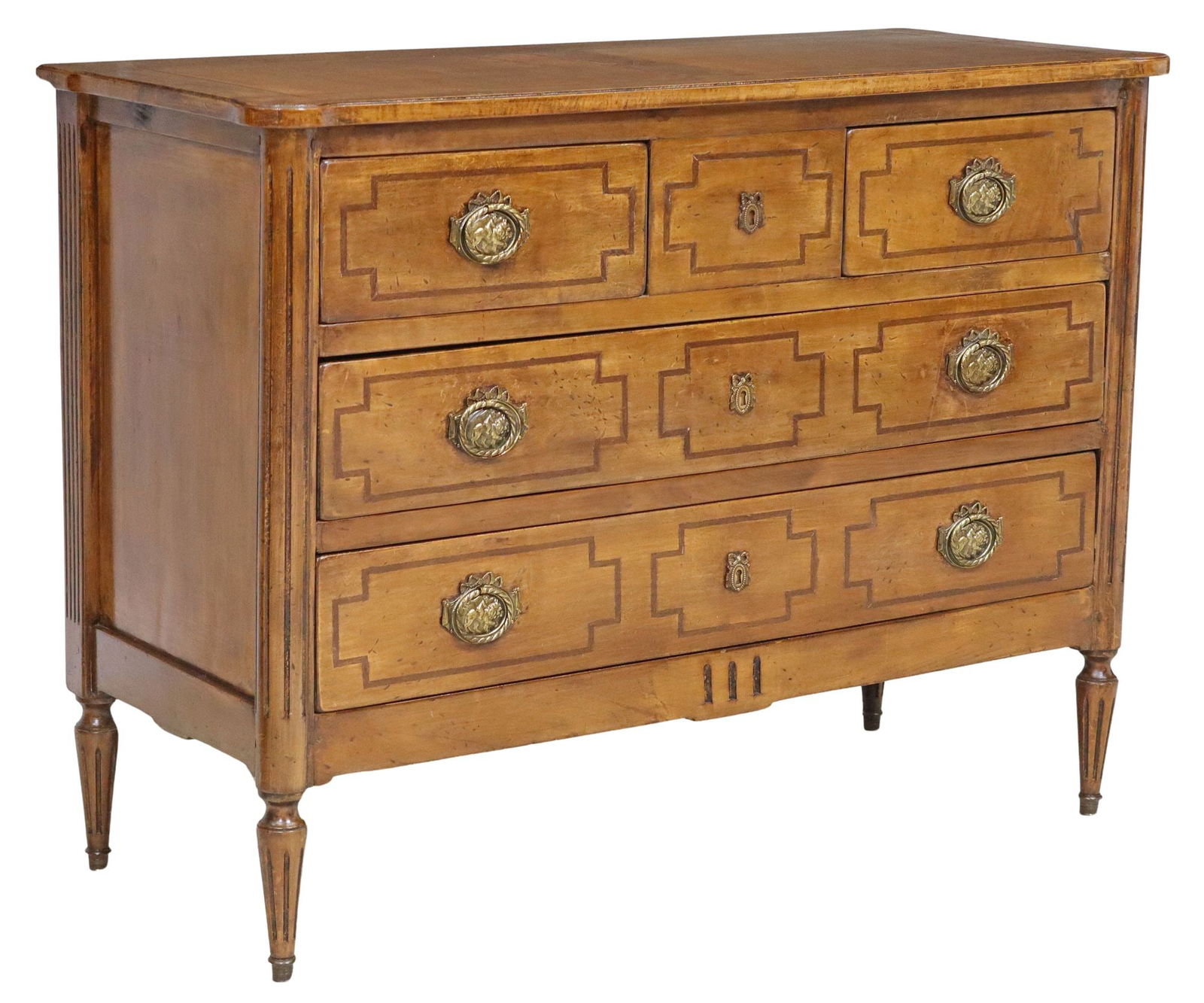 FRENCH NEOCLASSICAL STYLE INLAID PARQUETRY COMMODE: French Neoclassical style parquetry commode, 19th c., rectangular top with central star-form parquetry, over four drawers with inlaid trim, rising on fluted tapered legs, ending on metal capped feet,