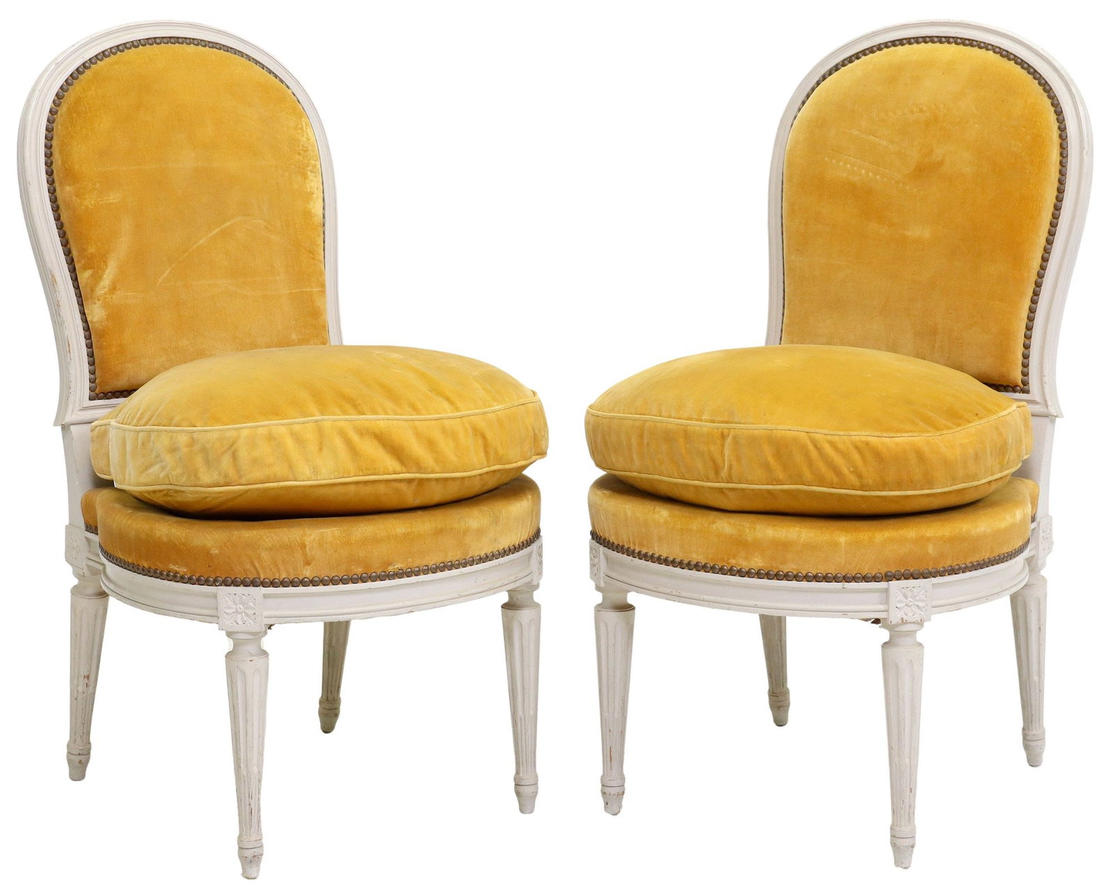 (2) FRENCH LOUIS XVI STYLE PAINTED & UPHOLSTERED LOW SLIPPER CHAIRS: (pair) French Louis XVI style low chairs, 20th c., painted frame, in velvet upholstery, loose seat cushion, on tapering fluted legs, approx 34.25"h, 18.75"w, 20.5"d