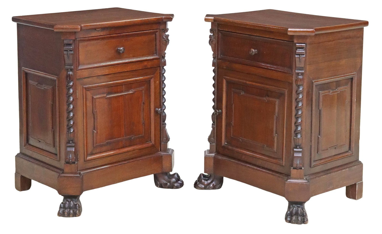 (2) ITALIAN RENAISSANCE REVIVAL WALNUT NIGHTSTANDS: (pair) Italian Renaissance Revival carved walnut bedside cabinets, early 20th c., each having shaped top, over drawer and single cabinet door, revealing shelved interior, rising on paw feet, approx 27