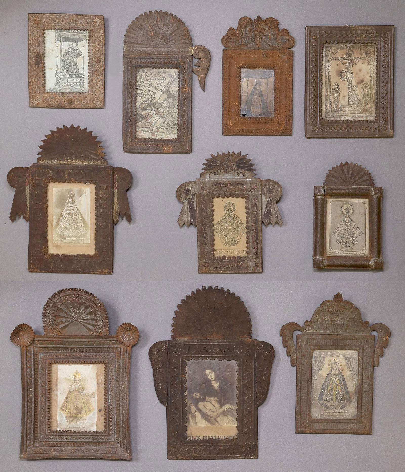 (10) FRAMED RELIGIOUS RETABLO PRINTS, MEXICO: (lot of 10) Framed retablo prints, Mexico, each housed in an embossed metal nicho/frame, highlights include: (1) Nuestra Senora Milagrosa de La Piedad, (1) El Nino Jesus De Praga, (1) Glorioso Arcange
