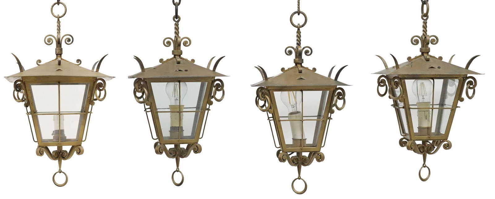 (4) ITALIAN GILT IRON & GLASS 1-LT LANTERN LAMPS: (lot of 4) Italian gilt iron and glass single-light lanterns, 20th c., having tapered rectangular frame with inset colorless glass side panels, sides with scrolled motifs, containing central faux cand