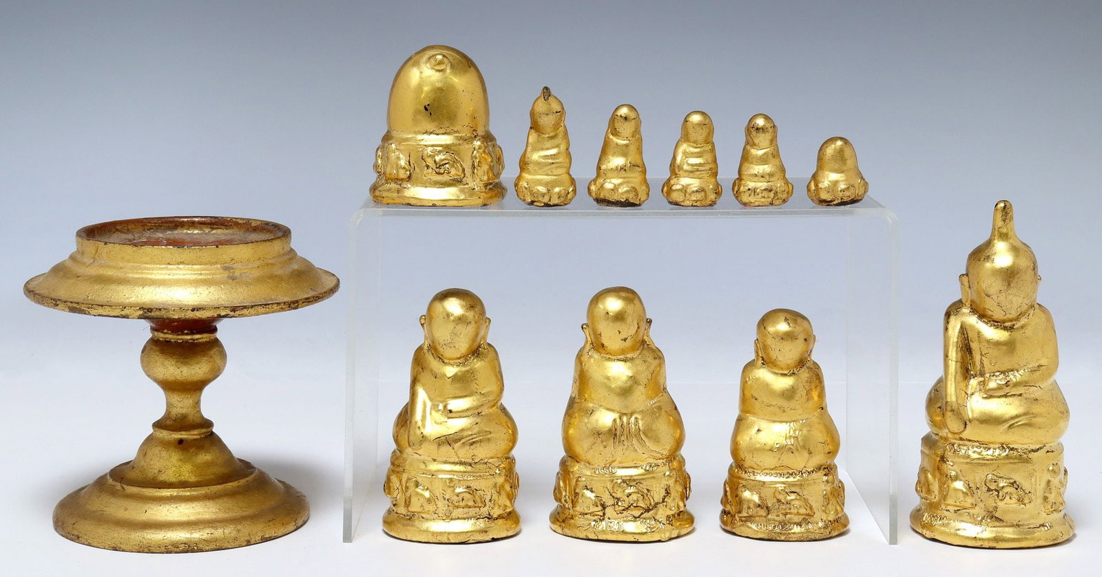 (11) BUDDHIST GILTWOOD OFFERING FIGURES & PEDESTAL: (11) Buddhist giltwood and lacquered temple offering figures, including: (1) pedestal with dished top, approx 4"h, 4.25"w, (10) faceless figures, including some of the Buddha, largest: 4 5/8