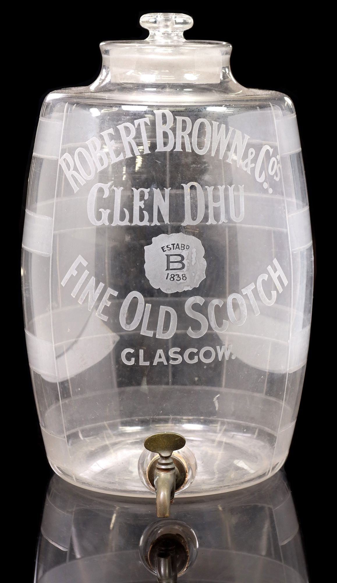 SCOTTISH ROBERT BROWN CO. GLASS SCOTCH DISPENSER: Scottish molded glass beverage dispenser, Robert Brown and Company, Glasgow, with frosted glass banding and lettering inscribed Glen Dhu Fine Old Scotch, patinated metal and cork spigot, approx 1