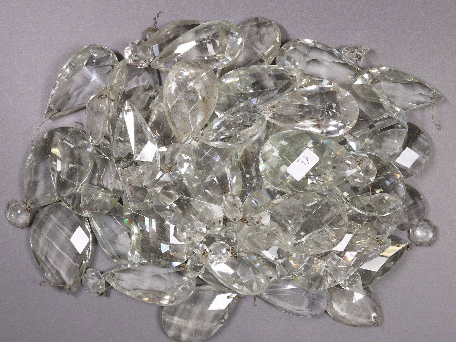 (LOT) CUT CRYSTAL CHANDELIER DROPS: (lot) Cut crystal chandelier drops, parts and pieces, including faceted teardrop pendalogues, some with top bead, largest: approx 3.5"h, 2.25"w, 13.75lbs total