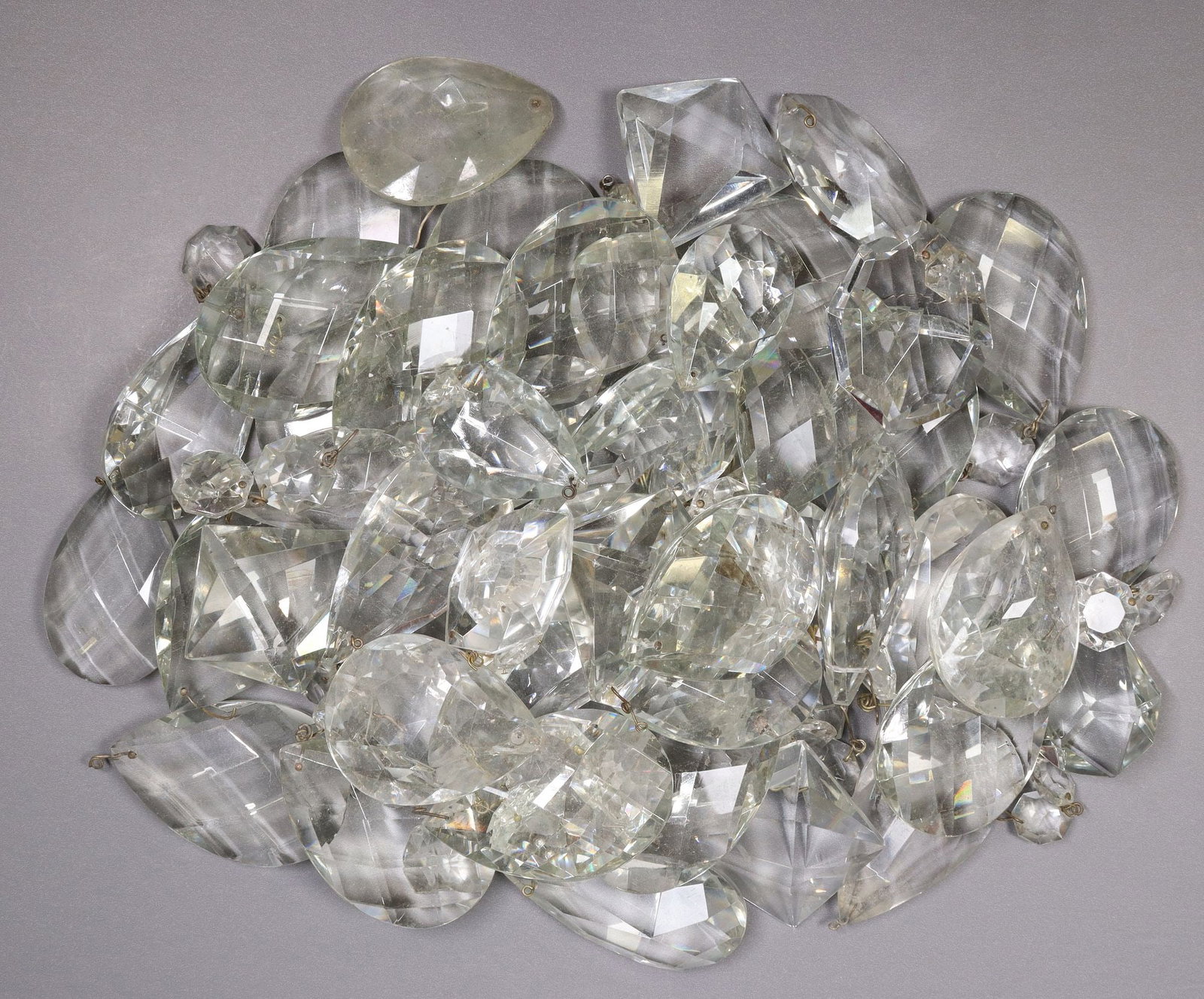 (LOT) CUT CRYSTAL CHANDELIER DROPS: (lot) Cut crystal chandelier drops, parts and pieces, including faceted teardrop pendalogues, some with top bead, largest: approx 3.5"h, 2.25"w, 12.25lbs total
