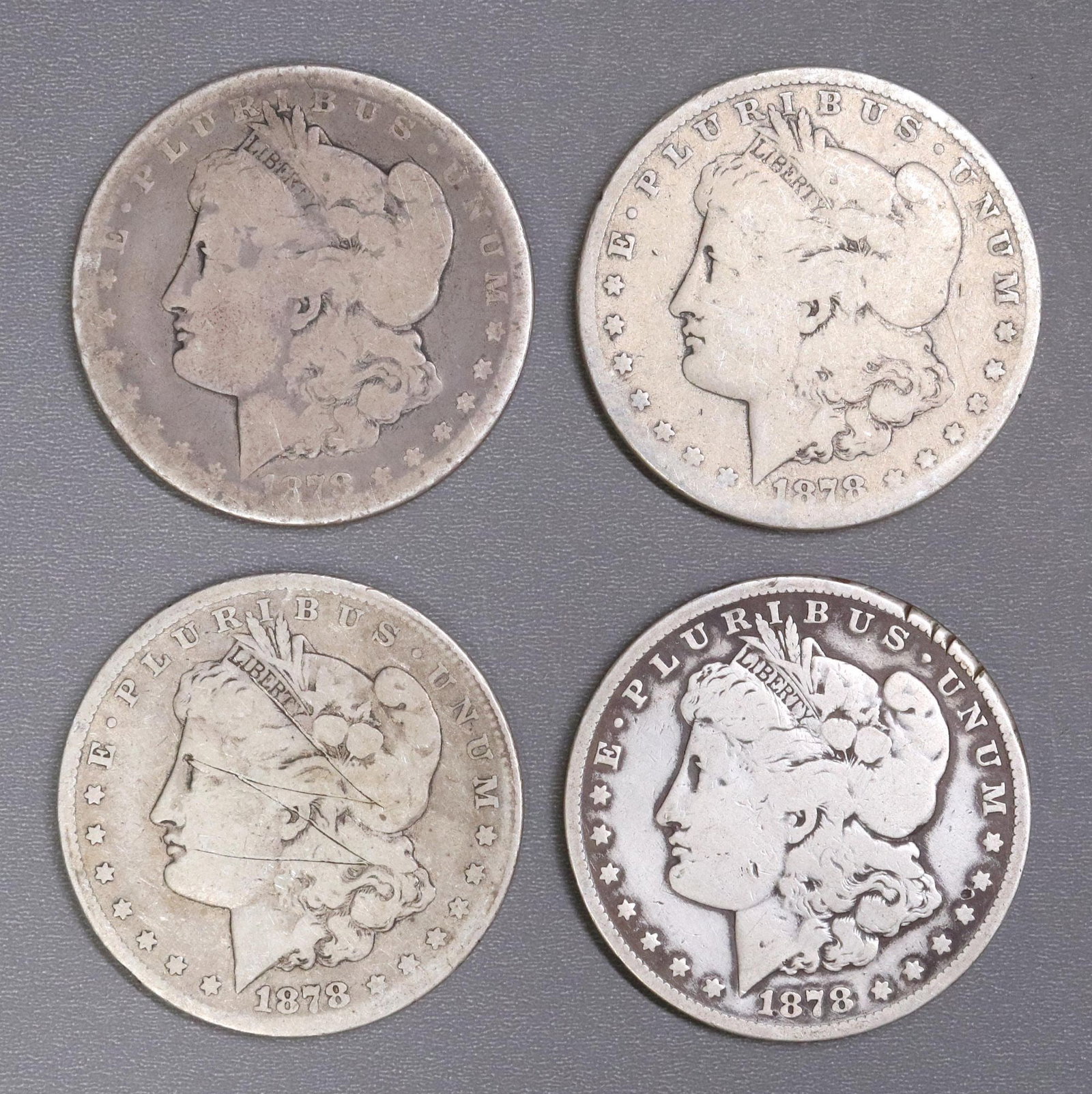 (4) U.S. 1878 CARSON CITY SILVER DOLLARS: (lot of 4) U.S. 1878 Carson City Silver Dollars Start Price: $100.00