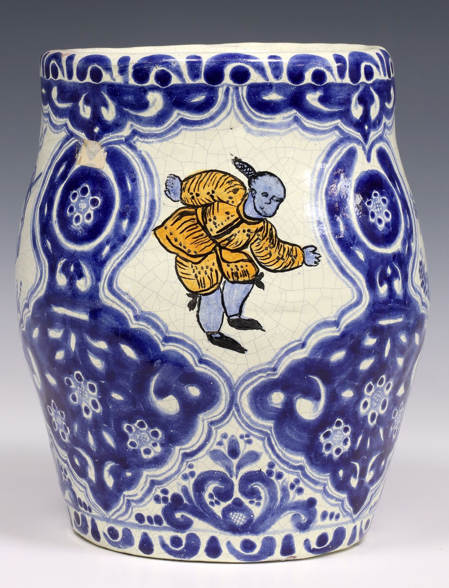 BLUE & WHITE POTTERY VASE: Tin-glazed earthenware vase, Mexico, white crackled glaze, ornamented with cobalt blue accents, painted male figures, signed Talavera Rossier underfoot, approx 10"h, 8.25"diam, 5lb
