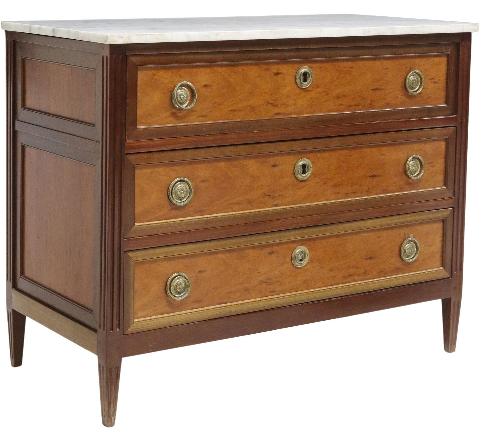 FRENCH LOUIS XVI STYLE MARBLE-TOP COMMODE: French Louis XVI style mixed wood commode, 19th c., having rectangular marble top, over three drawers with mahogany trim, recessed panels of a contrasting burled wood, framed by pilasters, rising on t