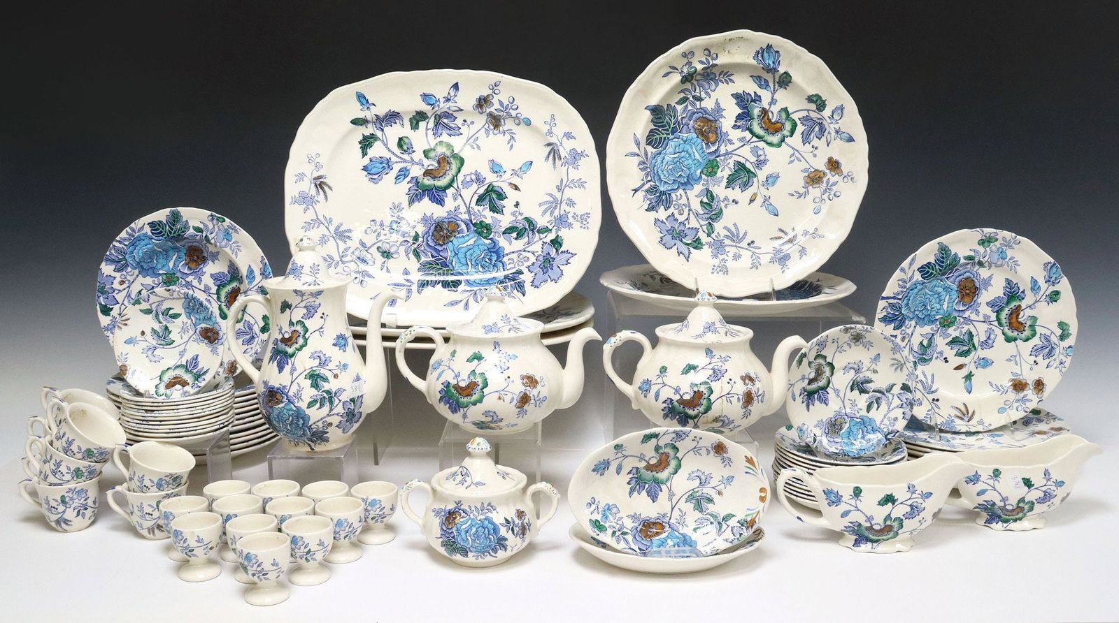 (77) ENGLISH MASONS PATENT IRONSTONE CHINA 'BELVEDERE' DINNER SERVICE: (lot of 77) English Masons Patent Ironstone China partial dinner service, in the "Belvedere" pattern, with transfer blue, green, and brown floral motifs, hand-painted accents, make