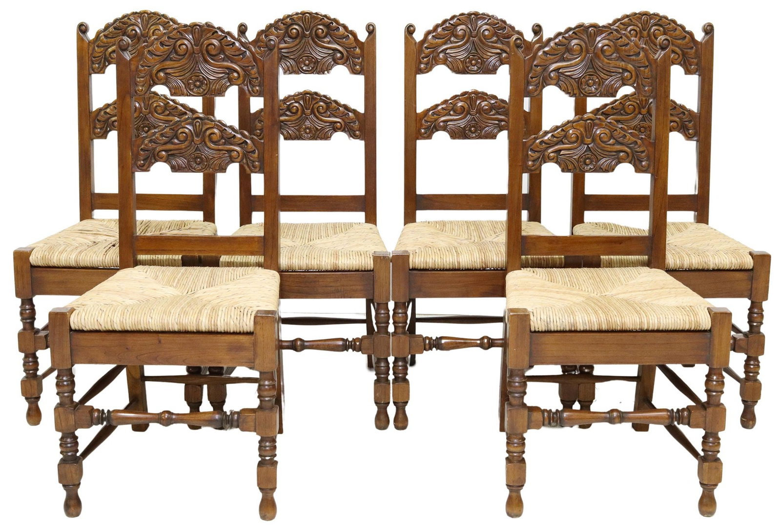(6) ENGLISH SOUTH YORKSHIRE STYLE RUSH SEAT CHAIRS: (lot of 6) English South Yorkshire style carved side chairs, 20th c., carved splats between uprights with scroll finials, over woven rush seat, rising on turned stretcher-joined legs, ending on bun fe