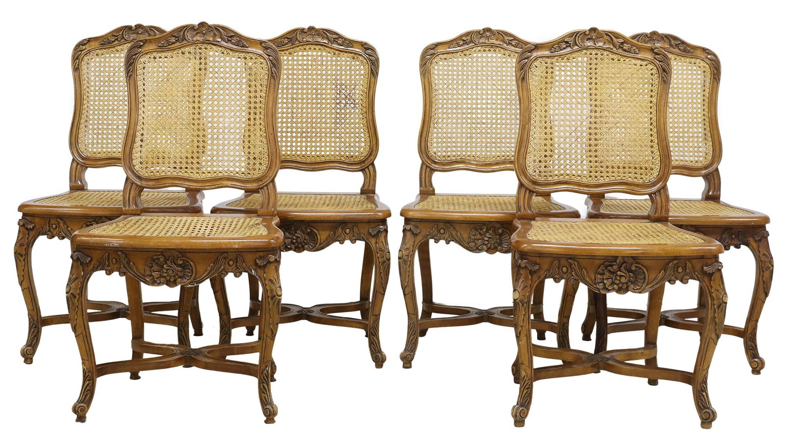 (6) FRENCH LOUIS XV STYLE CANED WALNUT DINING CHAIRS: (lot of 6) French Louis XV style carved walnut side chairs, early 20th c., having floral crest, over caned back and seat, rising on stretcher-joined cabriole legs, ending on whorl feet, some overall m