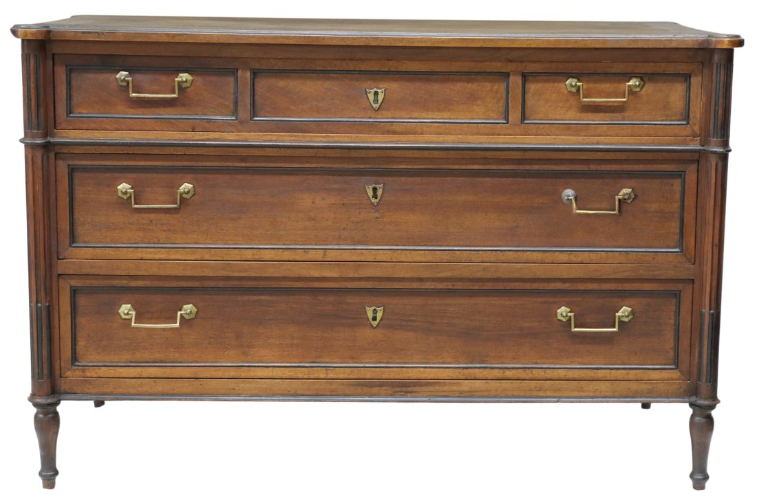 FRENCH LOUIS XVI STYLE MAHOGANY THREE-DRAWER COMMODE: French Louis XVI style mahogany commode, late 19th c., having three drawers, flanked by fluted corner posts, rising on tapered legs, ending on arrow feet, approx 33"h, 50.5"w, 24.5"d