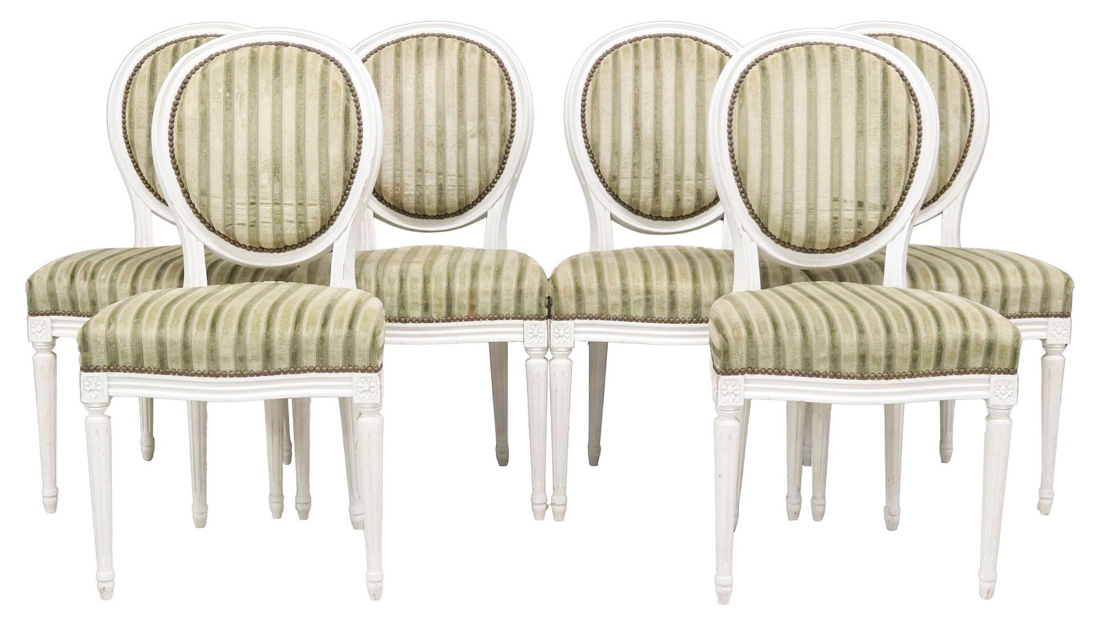 (6) FRENCH LOUIS XVI STYLE UPHOLSTERED SIDE CHAIRS: (lot of 6) French Louis XVI style dining chairs, 20th c., each having oval medallion back and padded seat, in striped fabric upholstery, with nailhead trim, rising on fluted tapered legs, ending on to