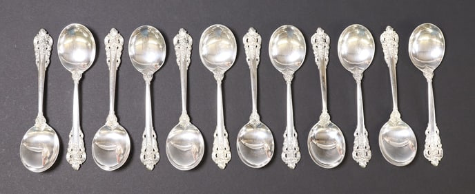 (12) WALLACE 'GRANDE BAROQUE' STERLING SILVER CREAM SOUP SPOONS