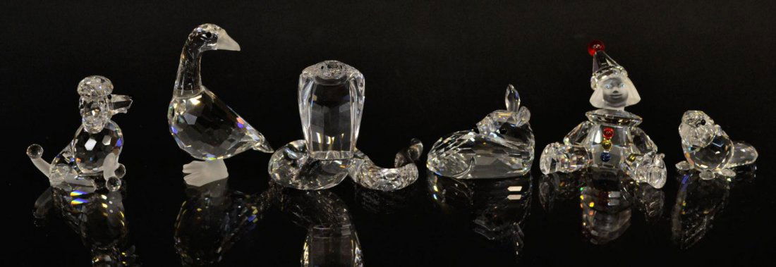 (6) SWAROVSKI CRYSTAL FIGURES, COBRA, DEER, PUPPET: (lot of 5) Swarovski crystal figures, in original boxes, comprising: (1) cobra, with certificate of authenticity , A 7603 NR 000 003; (1) roe deer fawn, with certificate of authenticity, A 7608 NR 000