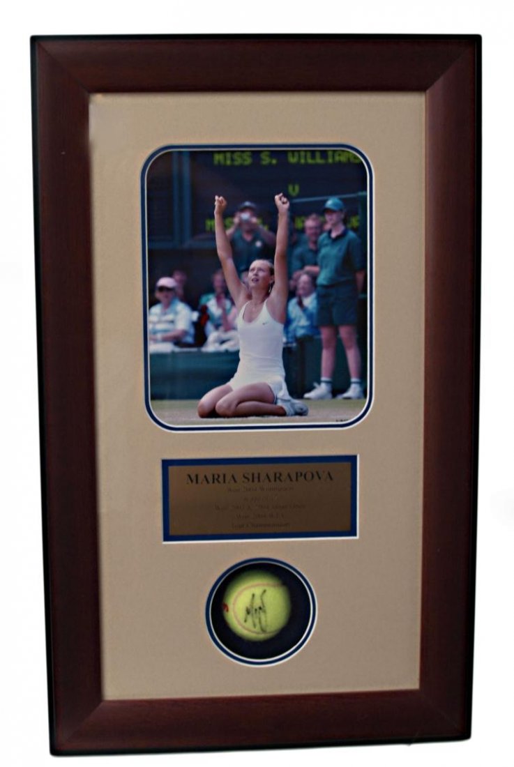 MARIA SHARAPOVA SHADOW BOX SIGNED TENNIS BALL: Maria Sharapova signed tennis ball, enclosed in a shadow box frame with photo and plaque 'Maria Sharapova, Won 204 Wimbledon at age of 17, Won 2003 & 2004 Japan Open Won 2004 WTA Tour Championship', a