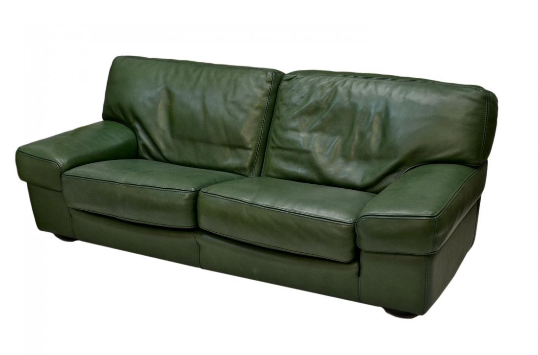 MODERN FRENCH ROCHE BOBOIS LEATHER SOFA: Modern French sofa by Roche Bobois in green leather upholstery, two oversized seat cushions, overstuffed arms, rising on short legs, Roche Bobois tag as pictured, 30.5"h, 77"l, 35.25"d Start Price: $3