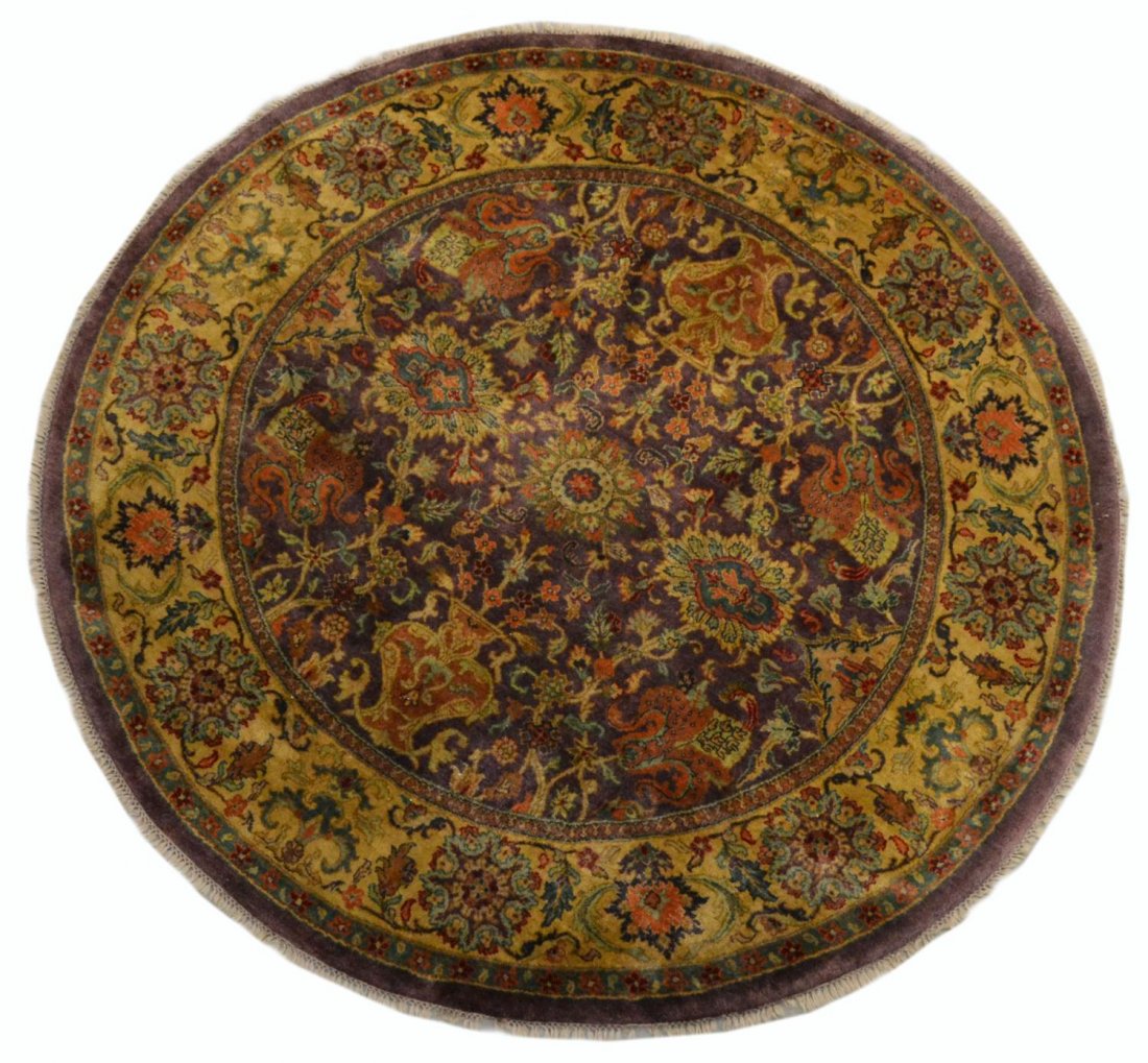 INDO-PERSIAN AGRA CIRCULAR RUG, 6'4"D: Indo-Persian Agra hand tied circular rug, 6'4"diam (inclusive of fringe) Start Price: $200.00