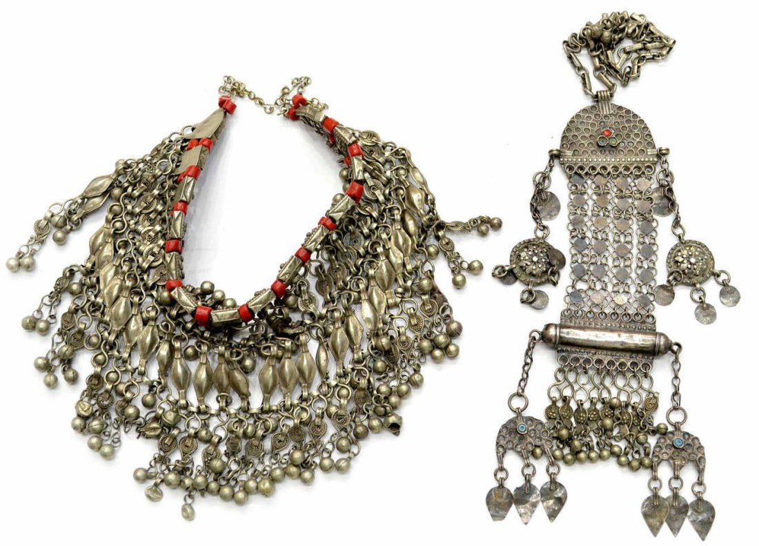 (2)MIDDLE EASTERN SILVER & RED CORAL BIB NECKLACES: (lot of 2) Middle Eastern silver and metal bib necklaces, Qatar, including: (1) composed of silver tone and red coral beads, stylized floral motif, minor losses, approx 18"l, 257 grams (all inclusive)