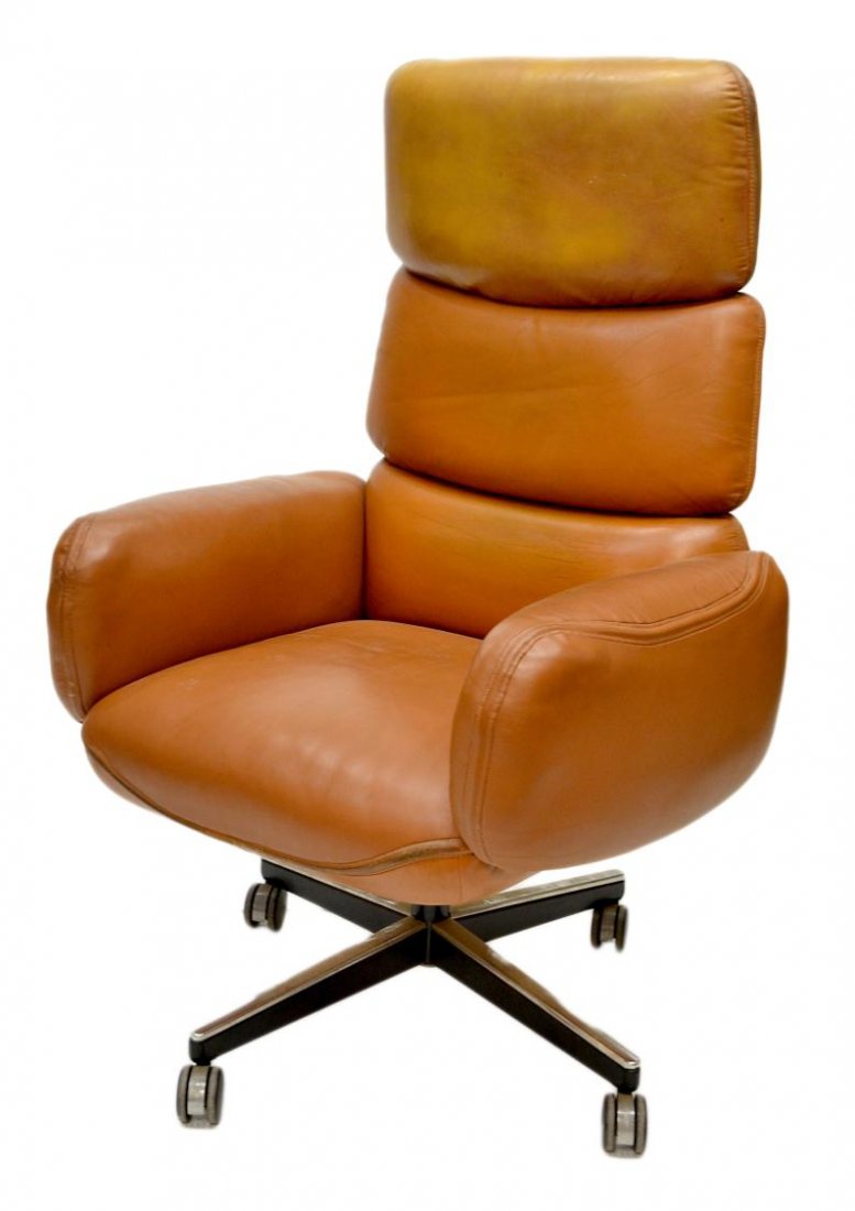 KNOLL MID-CENTURY MODERN LEATHER OFFICE CHAIR: Knoll International mid-century modern tilting leather office chair, c. 1960, two cushion leather back set on steel supports over leather seat, swivel chrome and black metal base on castors, marked at