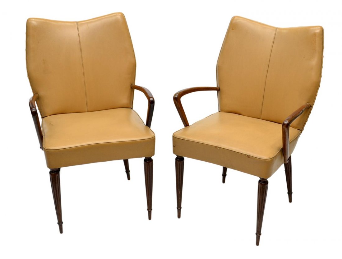 ITALIAN MID-CENTURY MODERN CHAIRS, PAOLO BUFFA: (pair) Italian mid-century modern arm chairs, c. 1960, design by Paolo Buffa (Italian, 1903-1970), leather upholstery with angular mahogany arms, set on fluted tapered legs, 35"h, 21.5"w 19"d Start Pr