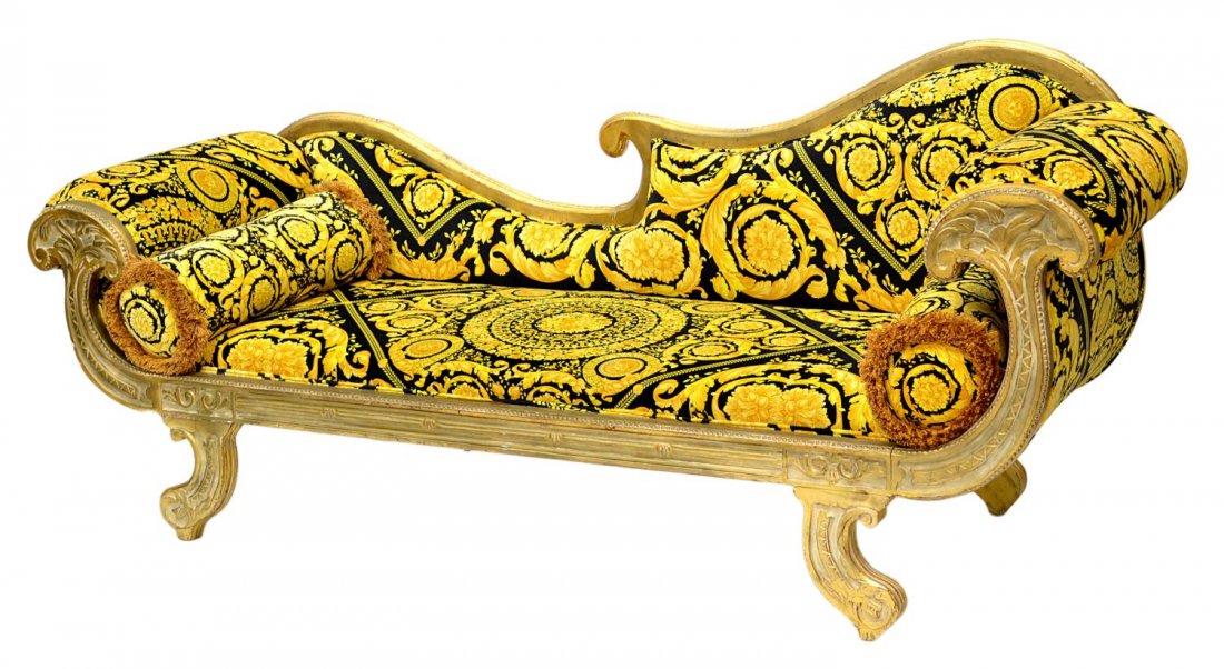 VERSACE MILADY MEDUSA UPHOLSTERED SOFA: Versace Milady framed sofa, purchased through the Versace store, Houston, Versace Home Heritage Collection, a gilt frame with Medusa foliate black and gold upholstery, some chipping and cracks to gess