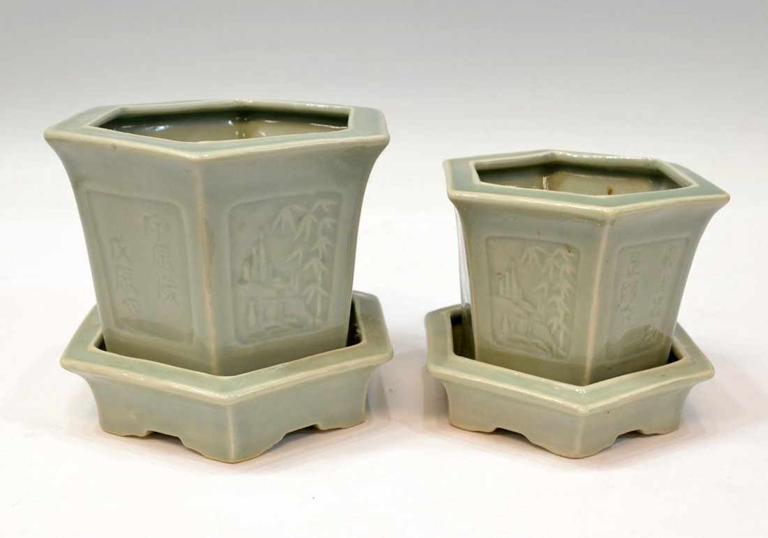 CHINESE CELADON HEXAGONAL FLOWER POTS: (lot of 2) Chinese celadon glazed hexagonal planters with fitted bases, panels showing foliage in low relief and incised characters, larger pot with large fracture as pictured, large: 5.25"h, small: 4