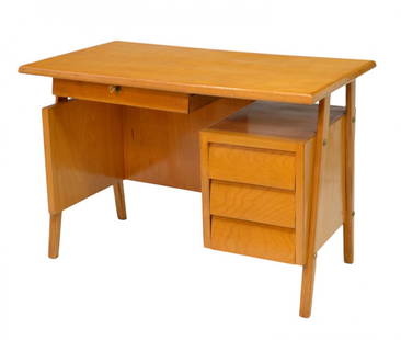 ITALIAN MID-CENTURY DESK, ATTRIB. DASSI LISSONE: Italian mid-century modern desk attributed to Dassi Lissone, Milan, c. 1950, maple finish with a center drawer, a single pedestal under an open space with three drawers, rising on angled squared taper