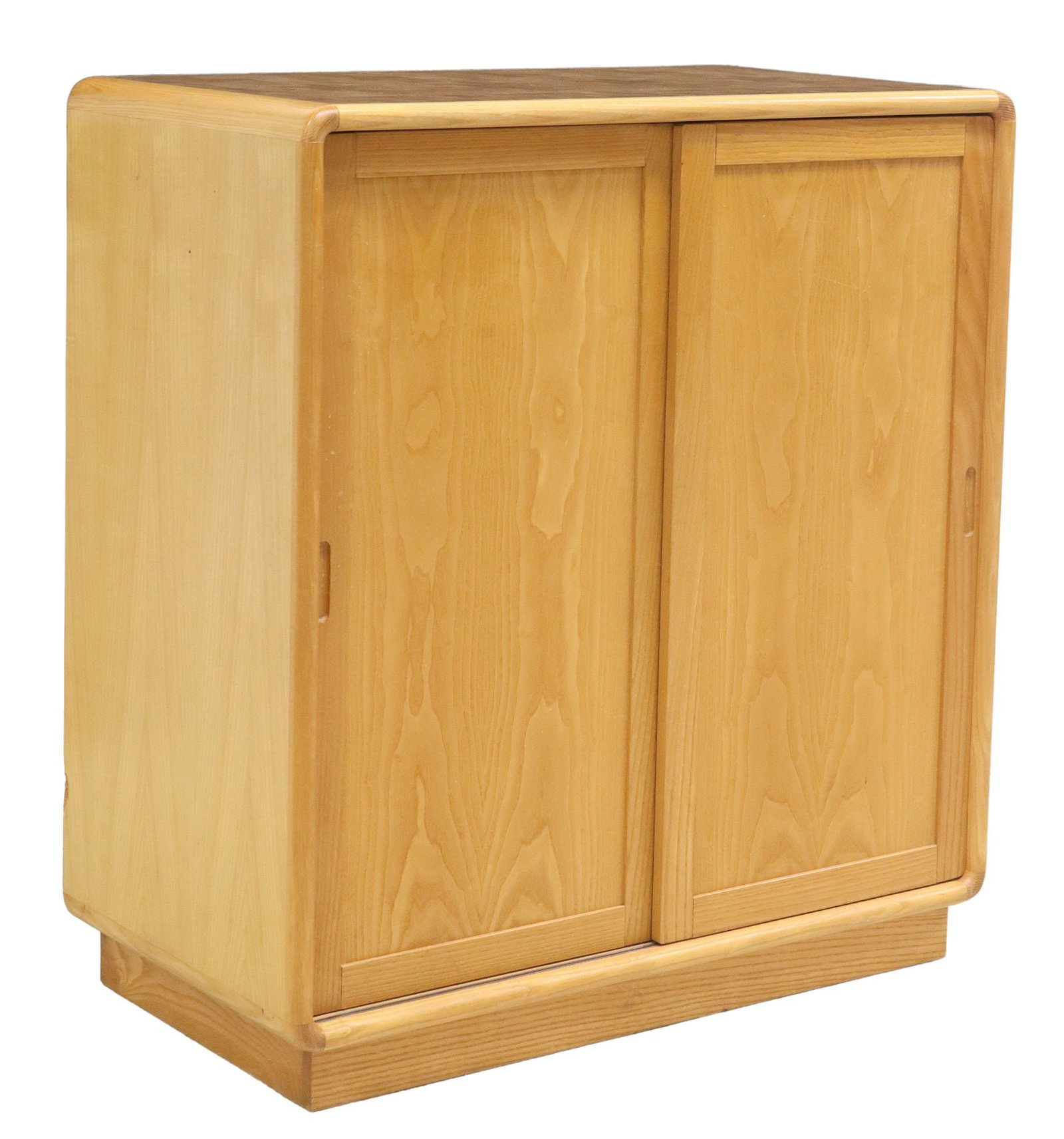 SCANDINAVIAN MID-CENTURY MODERN CABINET WITH END GRAIN PARQUETRY TOP: Scandinavian mid-century modern cabinet/ cupboard, c.1970s, end grain parquetry top, dual sliding doors, enclosing adjustable-height shelves, on an inset plinth base, deep scrape to back edg