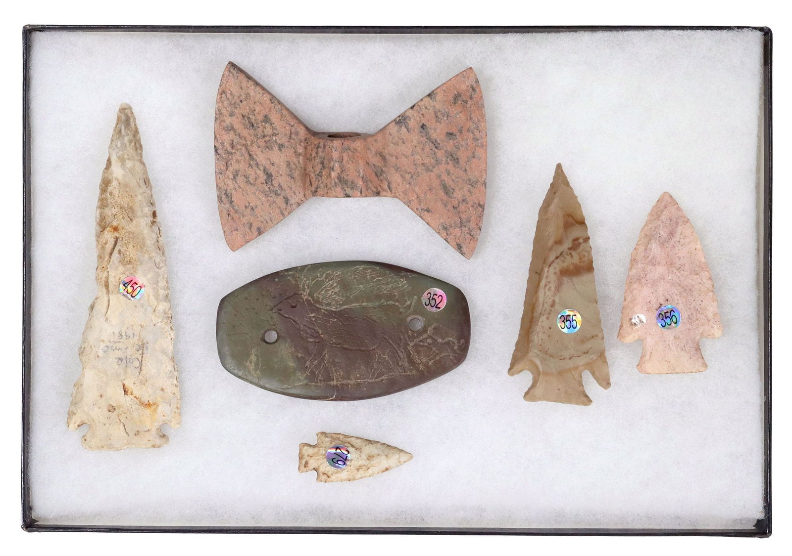 (6) STONE ARROWHEAD, SPEAR POINT, GORGET: (lot of 6) Stone spearpoint marked Cole County, Mo. (approx. 5.5/8"l, 1.75"w), gorget with etched deer, doe and trees (approx. 2.25"h, 4.25"w), likely modern granite axe head, all