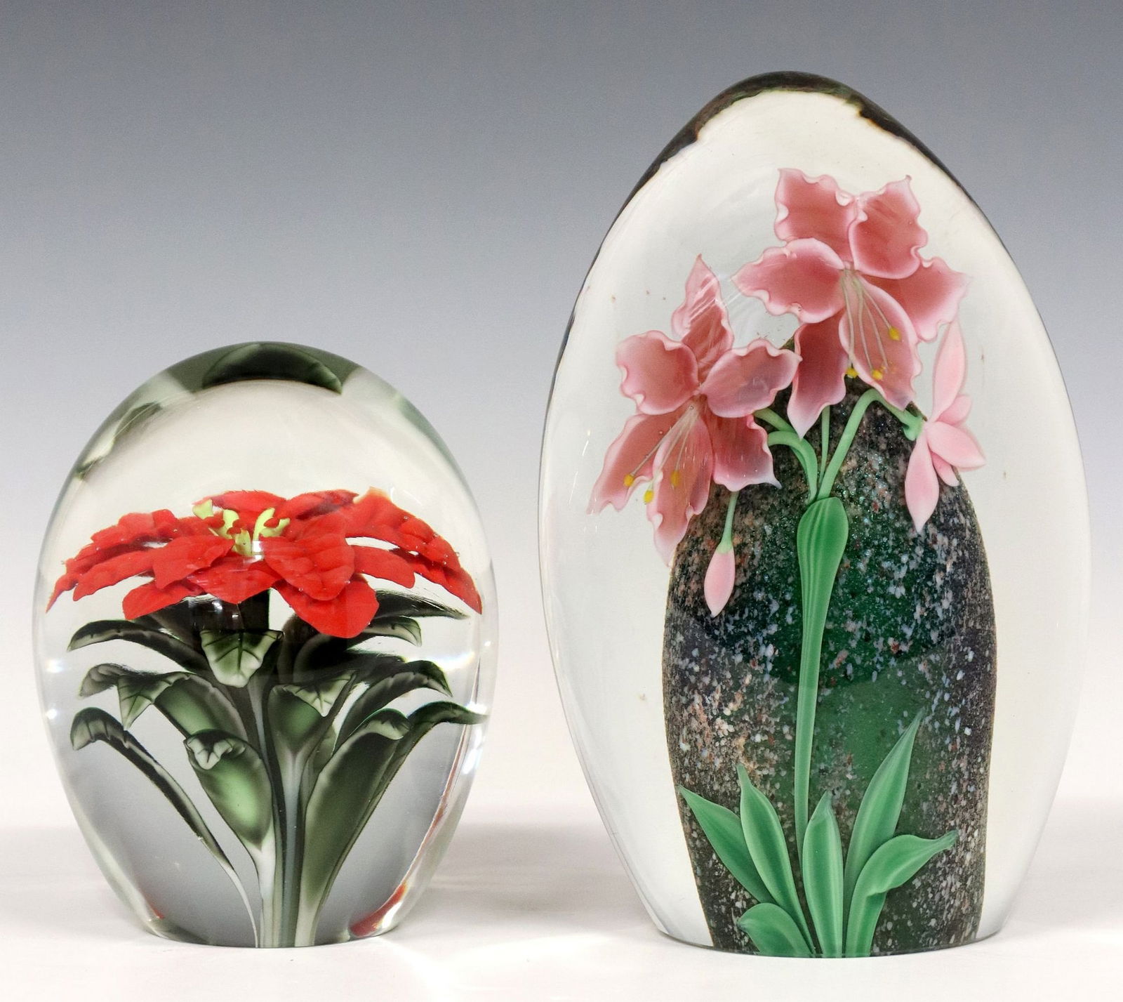 (2) BRUCE SILLARS FOR ORIENT & FLUME ART GLASS LAMPWORK PAPERWEIGHTS: (lot of 2) Large studio art glass lampwork paperweights/ sculptures, Bruce Sillars (American, 20th c.) for Orient and Flume, each with lampwork flower in colorless case, signed Sillars Orient & Fl