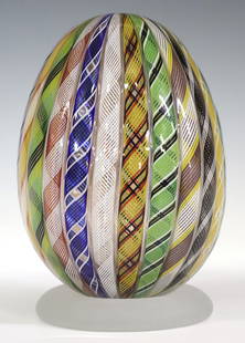 MICHAEL HUNTER (B.1958) TWISTS STUDIO GLASS ZANFIRICO EGG: Zanfirico glass egg, Twists Glass Studio (Michael James Hunter, English, b.1958) (Susan Jane Hunter, English, b.1960), on a satin glass stand, signed underfoot, approx 5.75"h, 4"diam, 1