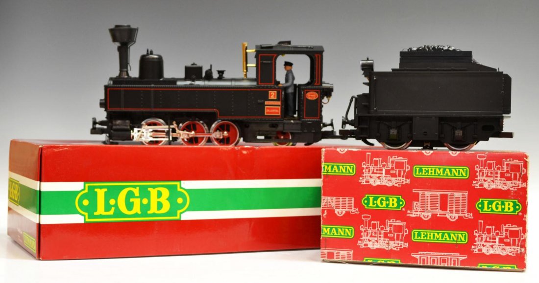 (2) LGB LOCOMOTIVE #2071D & TENDER #2217/6: (lot of 2) LGB model train steam locomotive #2071 D, styrofoam box and original outer box, together with coal tender #2217/6 in original box, largest box: 5.5"h, 18.5"l, 8.5"w, total: 8.75lbs Start Pr