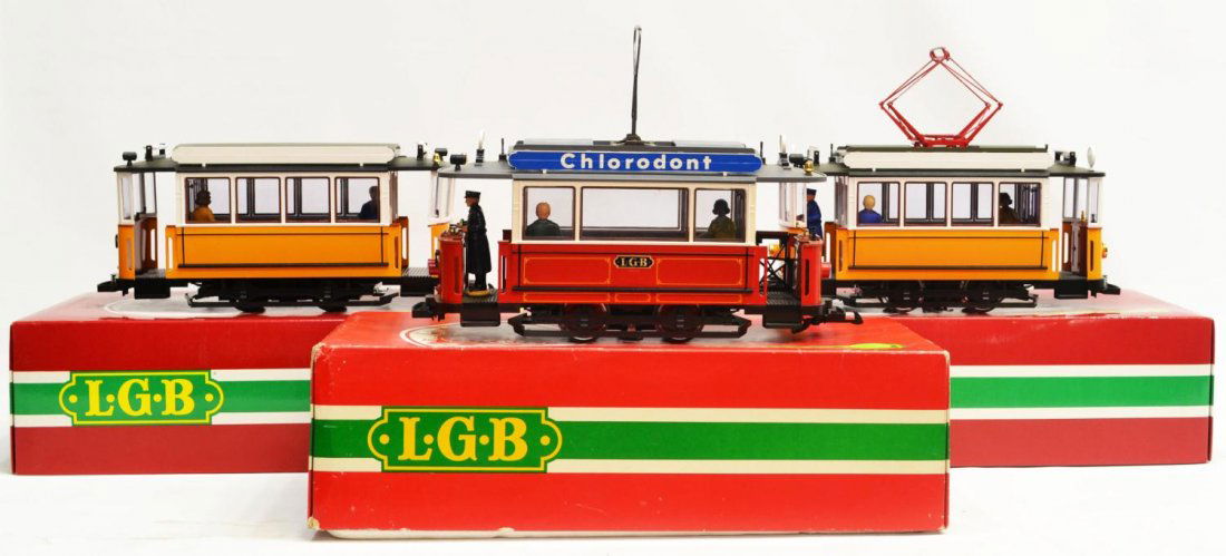 (3) LGB MODEL TRAIN TROLLEYS, #2035, #2036, #3500: (lot of 3) LGB model train cars, G gauge, in original boxes: (1) powered trolley #2035; (1) companion trailer #3500; (1) powered trolley #2036; largest box: 6"h, 18.5"w, 8.5"d, total: 14lbs Start Pric