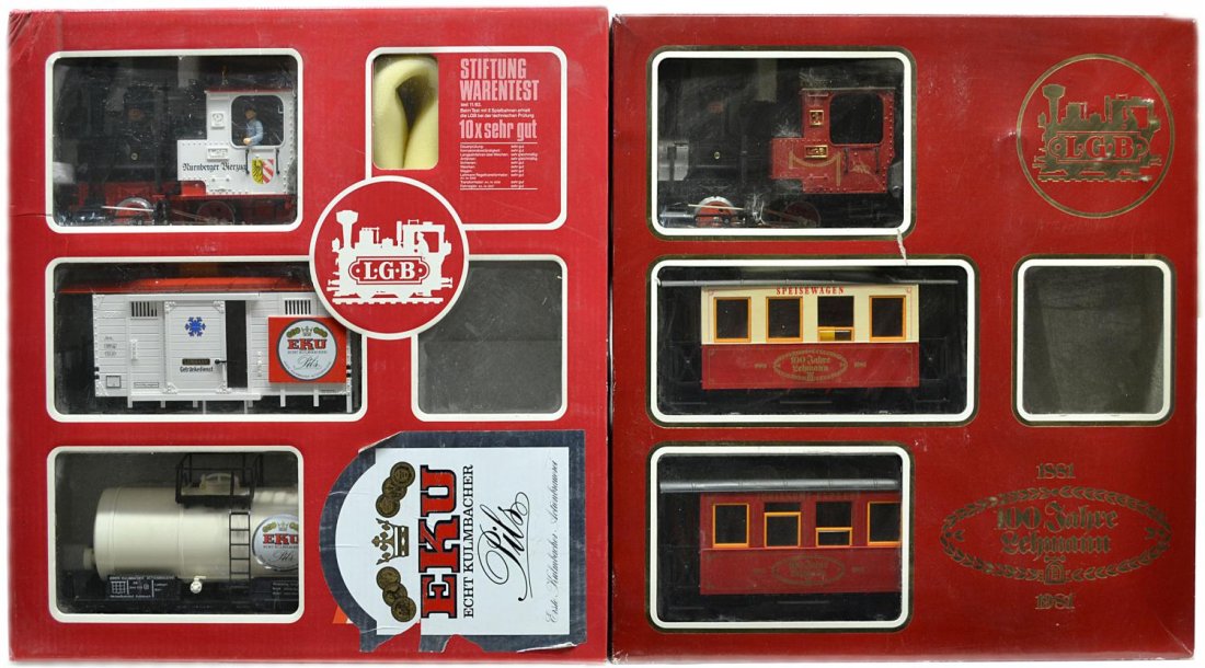 (2) LGB TRAIN SETS, EKU PILS & 100 JAHRE LEHMANN: (lot of 2) LGB model train sets, G gauge, original boxes: (1) 100 Jahre Lehmann (100th Lehmann Anniversary) train, engine #2010, two passenger cars; (1) EKU Pils train, engine #2020, freight car and t