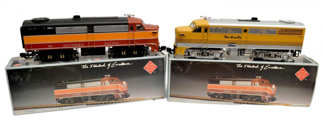 (2) REA MODEL TRAIN DIESEL LOCOMOTIVES, BOXES: (lot of 2) Railway Express Agency model train locomotives in original boxes: (1) REA-22008, Rio Grande, Diesel Alco FA-1 (1) REA-22004, South Pacific/Daylight, Diesel Alco FA-1; each box: 7.75"h, 6"w,