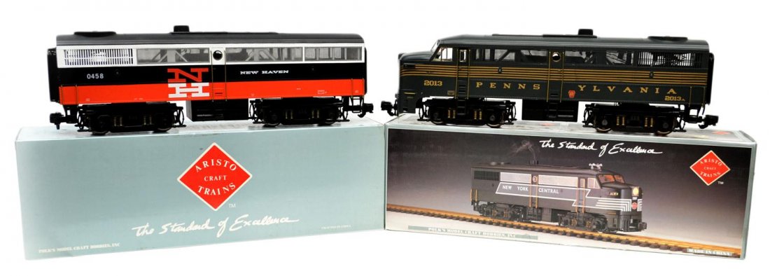 (2) ARISTO MODEL TRAIN DIESEL LOCOMOTIVES, BOXES: (lot of 2) Aristo Craft model train locomotives in original boxes: (1) ART-22068, New Haven, Diesel Alco FB-1; (1) ART-22013, Penn. 5 Stripe Bruns. Green, Diesel Alco FA-1; largest box: 7.75"h, 6"w, 2