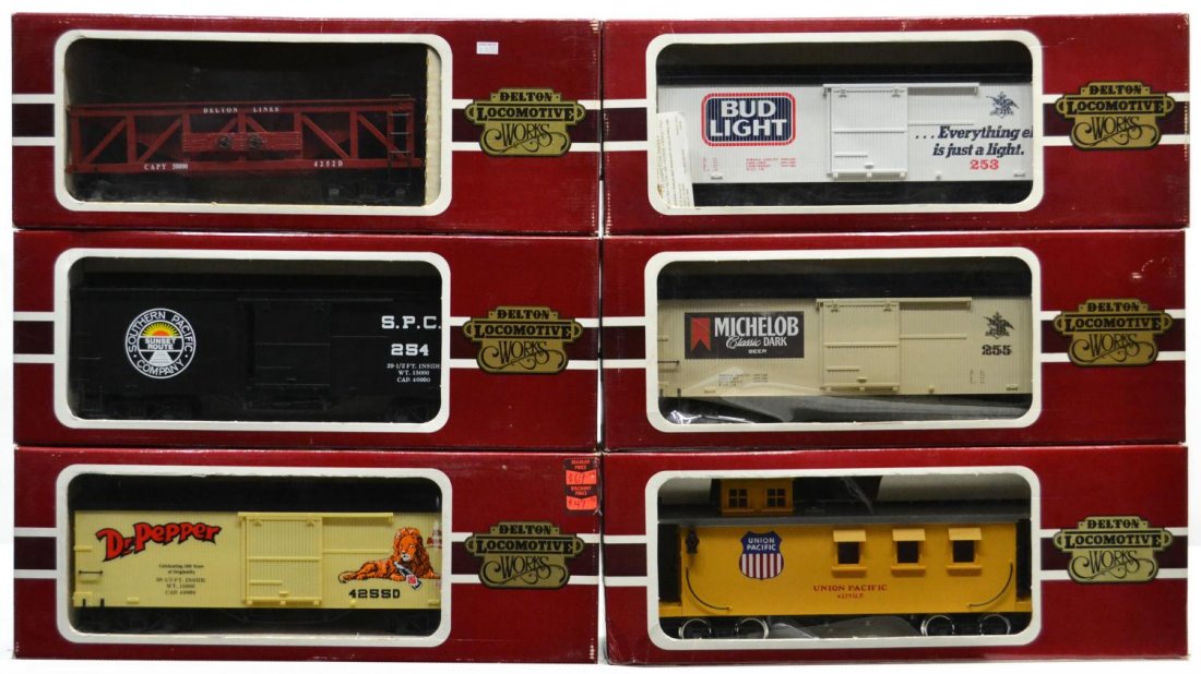 (6) DELTON LINES VARIOUS MODEL TRAIN CARS, BOXES: (lot of 6) Delton Locomotive Works model train cars in original boxes: (1) 4275U, Union Pacific, Long Caboose; (1) 4255A5, Michelob Box Car, tan/brown roof; (1) 4253 D, Delton Lines Hopper Car, red; (