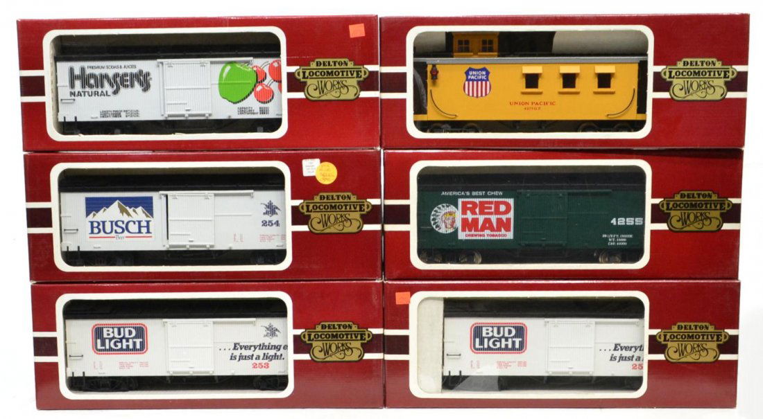 (6) DELTON LINES VARIOUS MODEL TRAIN CARS, BOXES: (lot of 6) Delton Locomotive Works model train cars in original boxes: (1) 4275U, Union Grande Long Caboose; (1) 4255R, Redman Tobacco box car' (2) 4255A6, Bud Light box car, white/black roof; (1) 425