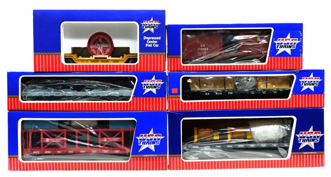 (6) USA VARIOUS MODEL TRAIN CARS IN ORGINAL BOXES: (lot of 6) USA Trains, various cars in original boxes: (1) 1890, mow/truck car; (1) 1702, D.&R.G.W., flat car with lumber; (1) R-17503, 20065, New York Central generator flat car; (1) R-17214, 10245, 
