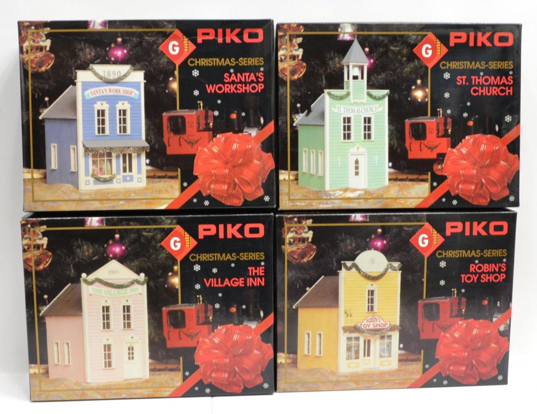 (4) PIKO MODEL TRAIN BUILDINGS, CHRISTMAS SERIES: (lot of 4) Piko model buildings, model train decoration, Christmas series, original boxes: (1) 62200, Santa's Workshop; (1) 62201, Robins Toy Shop; (1) 62202, The Village Inn; (1) 62203, St. Thomas Ch