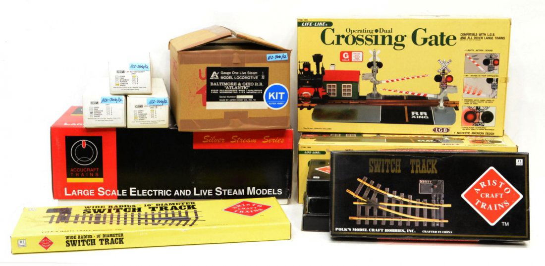 (12) COLLECTION OF MODEL TRAIN CARS & ACCESSORIES: (lot of 12) Collection of various model train cars and accessories: (1) AC82-102 Accucraft Trains SIlver Stream Series, Flanger OD Post - 1940; (1) 057 Aster Hobby, model locomotive kit, Baltimore & O