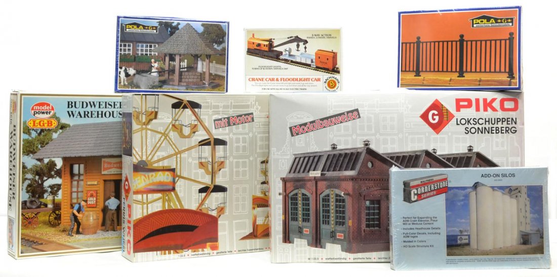 (7) GROUP OF VARIOUS TRAIN CARS AND ACCESORIES: (lot of 7) Group of Piko, Pola, Model Power, Bachmann, and Cornerstone model train cars, buildings, and accessories, in original boxes with some still sealed, comprising: (1) 62101 Piko, ferris wheel;