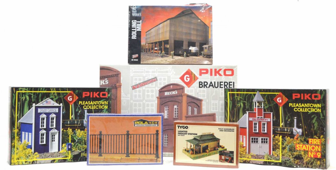 (6) GROUP OF VARIOUS MODEL TRAIN ACCESSORIES: (lot of 6) Group of Piko, Pola, Tyco, and USS The Works model train buildings and accessories, in original boxes with some still sealed, comprising: (1) 62014 Piko, brewery; (1) 62214 Piko, fire stati