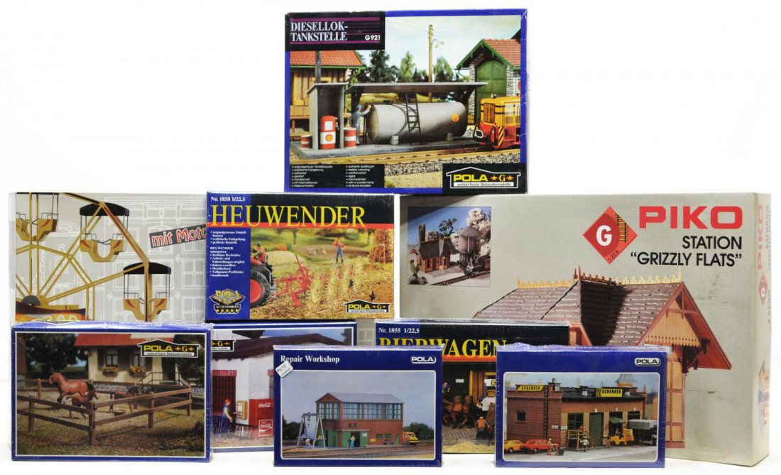 (9) GROUP OF PIKO AND POLA MODEL TRAIN ACCESORIES: (lot of 9) Group of Piko and Pola model train buildings and accessories, in original boxes with some still sealed, comprising: (1) 62101 Piko, ferris wheel; 62209 Piko, 'Grizzly Flats' station; (1) G9