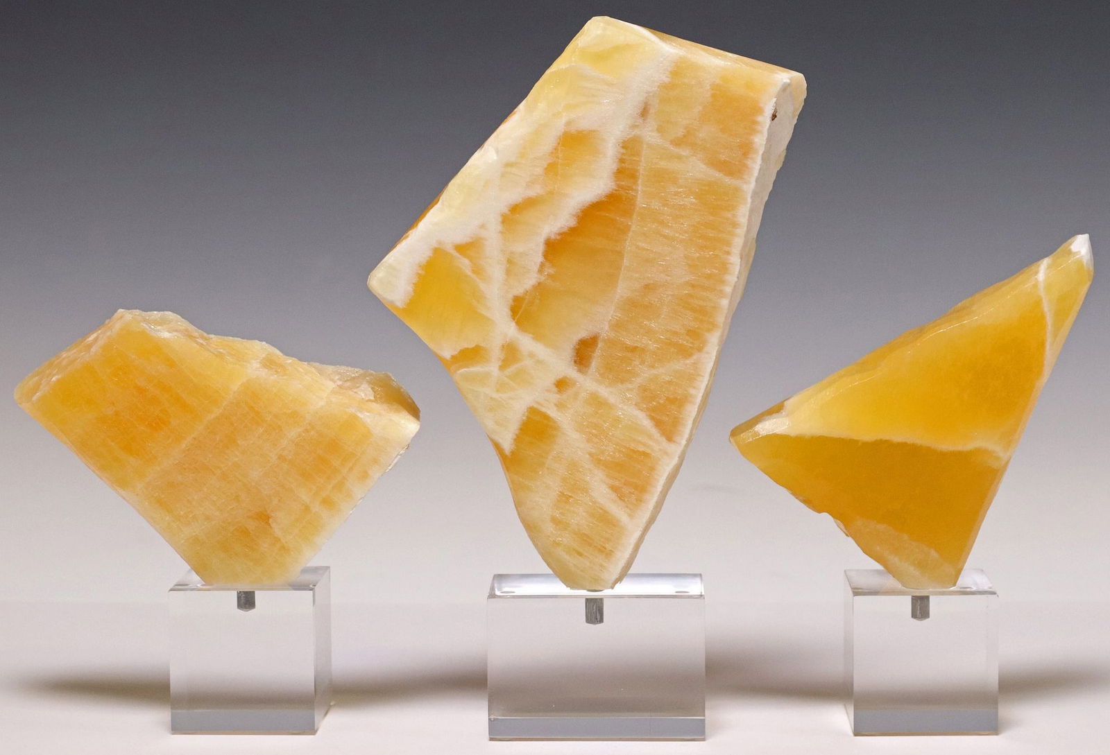 (3) GEOLOGICAL HONEYCOMB CALCITE SPECIMENS ON ACRYLIC BASES (1 of 3)