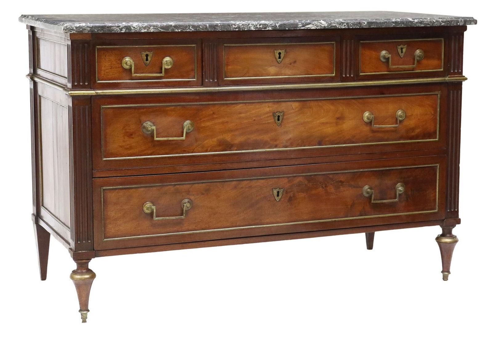 FRENCH LOUIS XVI STYLE MARBLE-TOP MAHOGANY COMMODE: French Louis XVI style mahogany commode, 20th c., having rectangular marble top, over three drawers with gilt metal banding and shield-form escutcheon, fluted corner posts, rising on tapering legs end