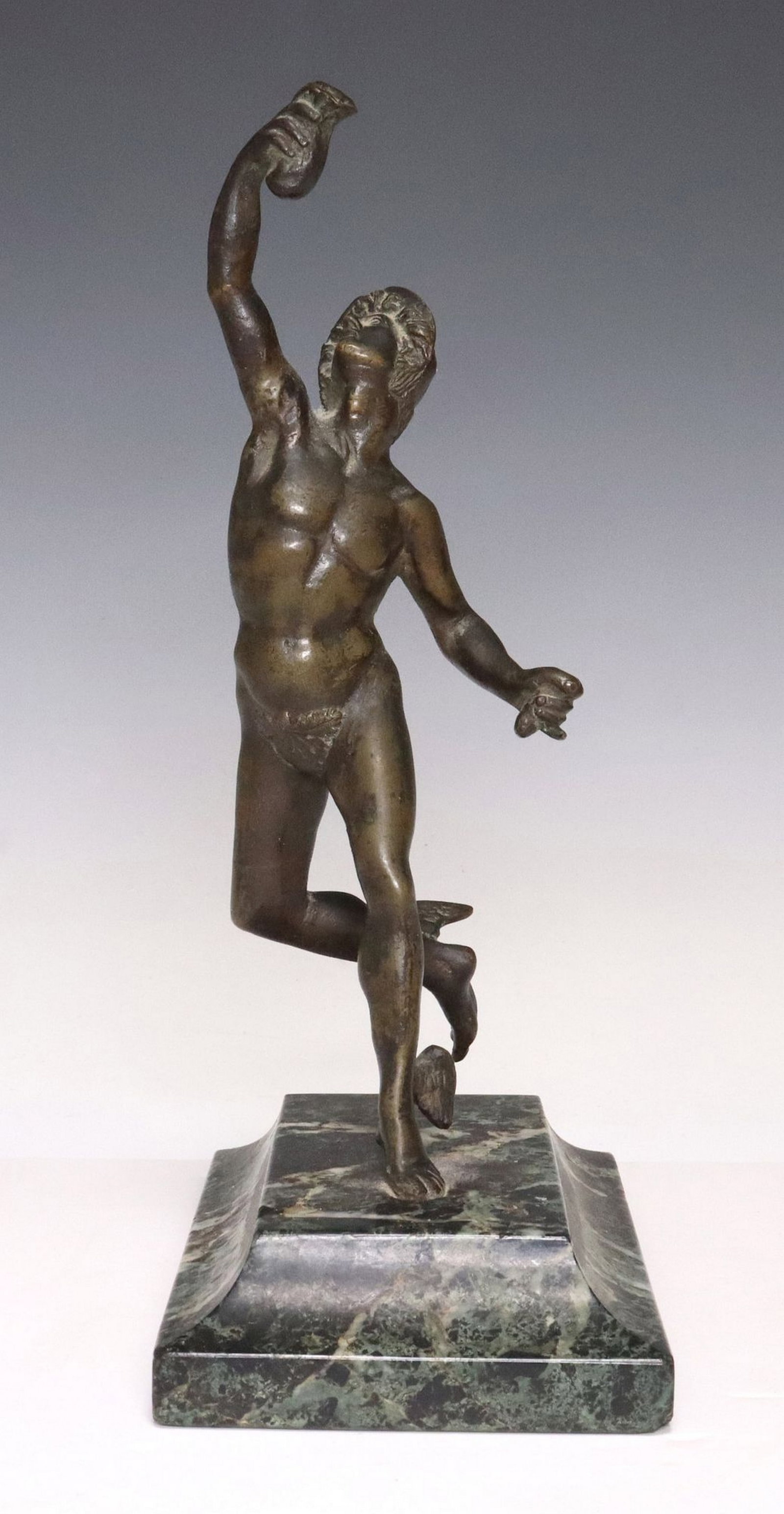 GRAND TOUR STYLE PATINATED BRONZE FIGURE MERCURY: Grand Tour style patinated bronze figure, Mercury, depicting the Greek god in dynamic pose, rising on stepped green marble base, lacking elements in hands and at helmet, approx 9.5"h, 5.75&q