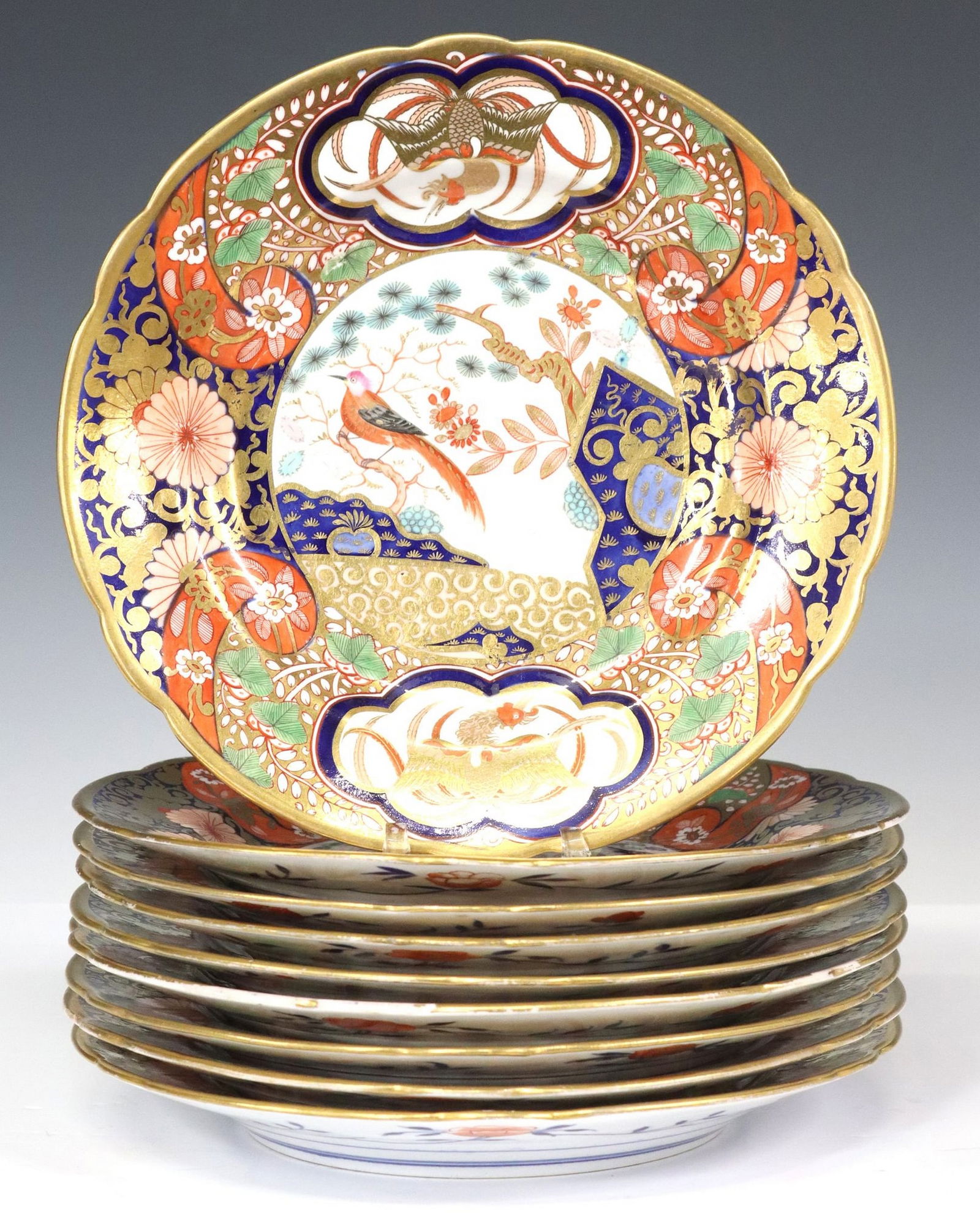 (10) SPODE PORCELAIN IMARI PATTERN #1291 DESSERT PLATES: (lot of 10) English Spode bone porcelain dessert plates, early 19th c., pattern No. 1291, richly gilded, painted in the Imari palette with Japanese style rocks, flowers, and birds, (three) intact with